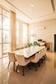Gently sand the edges of kitchen table and chairs set in random places to sand away some of the color and expose the underside stain to retain the country. 5 Dining Room Designs To Inspire You To Remodel Your Home Beautiful Dining Rooms Dining Room Furniture Arrangement Stylish Dining Room