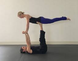 10 Partner Yoga Poses For A Strong And Flexible Relationship Partner Yoga Poses Partner Yoga Couples Yoga