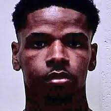 Man accused of pulling gun at drive-thru