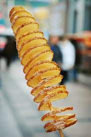 It is widely believed that the sprial sliced potato on a stick originated in seoul, south korea as a street vendors' snack. Twistto The Commons Street Feast