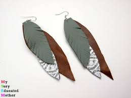 This will add a little 3d effect to the leaf or feather. My Very Educated Mother Diy Leather Feather Earrings