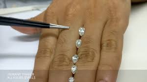 pear shape diamond size comparison on hand real view