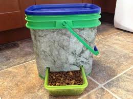 Diy Dry Food Dispenser A Disposable Aluminium Pan Is Used On The Inside To Help Direct All The Food Into The Tr Diy Cat Food Diy Dog Stuff Diy Stuffed Animals