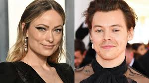 The lace dress shirt underneath harry's tuxedo complemented the lace trim on olivia's floral maxi dress, and both wore. Harry Styles And Olivia Wilde Dating Seen Holding Hands At A Wedding