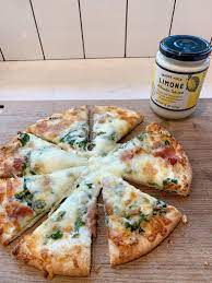 Trader Joe S Limone Alfredo Homemade Pizza With Arugula Prosciutto 1111 Light Lane Recipe Homemade Pizza Trader Joes Pizza Recipes Homemade
