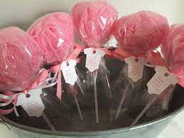 The shower is going to be purple, yellow, and green polka dots thus the colors of everything. Pink Baby Shower Favor Bath Puff Lollipop With Tag Etsy Pink Baby Shower Favors Baby Shower Favors Diy Baby Shower Favors