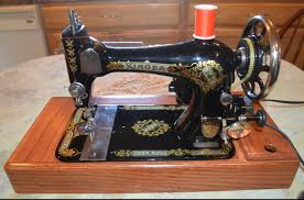 Image result for singer 28k