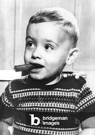 Image of Raymond Judd Jr, 29 months old, who smokes two cigarettes