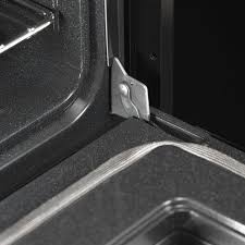 Remove the two screws located beside each of the hinges on the bottom of the door, using a screwdriver. How To Replace Your Oven Door Hinges Fred S Appliance