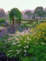 13 Fall Flowers To Add To Your Garden Town Country Living Country Garden Flowers Winter Garden Winter Gardening Plants