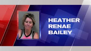 Mother arrested after two young kids left in hot car