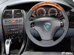 A while ago, i sat in a porsche cayman and i saw the clock in the middle of the dashboard. 20 Years Later Is The Proton Waja A Dream Or A Nightmare Wapcar