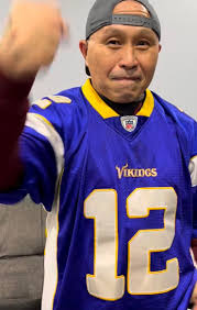 Our legendary Hmong singer Luj Yaj from Thailand is even rooting for the  Vikings tonight…