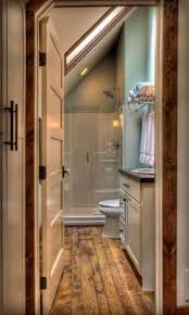 Bathrooms are tough rooms to make stylish. Land 39 S End Development Attic Bathroom Ideas Slanted Ceiling Loft Bathroom Bathroom Sloped Ceiling Bathroom Loft Bathroom Slanted Ceiling