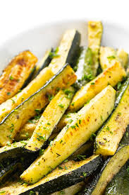 Place a zucchini on a cutting board and use a sharp knife to cut it lengthwise. How To Roast Zucchini Oven Roasted Zucchini Recipe Wholesome Yum