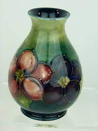 Maybe you would like to learn more about one of these? Antiques Atlas Moorcroft Clematis Pattern Vase Blue Green Ground