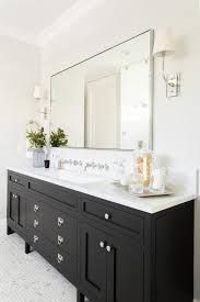A Gorgeous Black Bathroom Vanity Sits On Maze Marble Floor Tiles And Is Fitted W Black Vanity Bathroom Bathroom Inspiration Decor Farmhouse Bathroom Decor