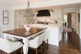 Expand your space with maple wood top work table with an adjustable lower shelf. Stained Butcher Block Dining Table With White Turned Legs Transitional Kitchen