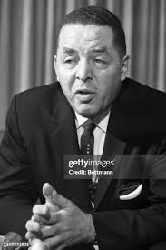 Moses Wright holds some clothing of his murdered nephew, Emmett Till...  News Photo
