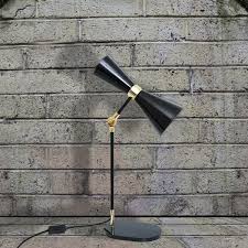 As shown, black metal with satin finished shade. How To Choose The Correct Table Lamp For Your Office Mullan Lighting