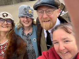 Island Coastguards in 1976 meeting up with the chap in uniform for a  training Rescue drill at Bradda Head. The person was named as District  Training Officer T.Richardson, but no mention of