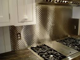 Stainless steel backsplash tiles are an ideal metal covering for the kitchen, bathroom, fireplace surround, wet bar, tub surround and other wall decors. Brushed 1 Quilted Stainless Steel Backsplash Kitchen Cookingrange Stainlesssteel Metal Tile Backsplash Metallic Backsplash Metal Tile