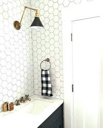 Black And White Hex Tile With Black Grout White Honeycomb Tile Feat White Hexagon Tile White Hexagonal Tiles With Black Grout And Black Cabinets W Bathroom Tile Designs Bathroom Decor Bathrooms Remodel