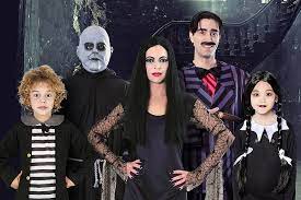 We started with dad aka gomez, he grew out his hair and mustache for his role, used a black and white stripped suite and we found a red bow tie in the men's section. Addams Family Costume Ideas Party Delights Blog