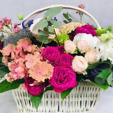 Download flowers in basket images and photos. Flower Basket With Different Flowers