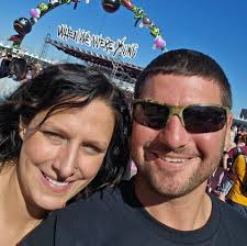 Don't be alarmed, citizen!" A former high school running star and Batman  fan wears the Dark Knight's cape and mask to keep him warm