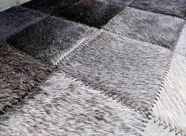 Black And White Square Rug Gradient At Its Best White To Black Patchwork Cowhide Rug In Square Tiles Rockin Patchwork Cowhide Patchwork Cowhide Rug Cow Hide Rug
