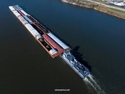 Want to see what 4,320 of diesel horsepower looks like? Here it is! The  Tennessee pushing a monster of a load down the Ohio River this evening. Not  too bad for 58