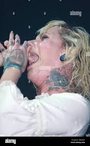 Singer Maria Brink of melodic metalcore band In This Moment is shown  performing on stage during a live concert appearance Stock Photo - Alamy