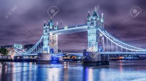 It stands 140 feet above the city, the views are spectacular and if you manage to climb up all the stairs to the upper level and have a head for heights, you can walk along the glass floor and watch the traffic going underneath the bridge. London The United Kingdom Tower Bridge On River Thames At Night Stock Photo Picture And Royalty Free Image Image 89523149