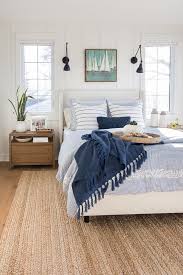 White And Blue Lake House Master Bedroom Home Decor Bedroom Stylish Bedroom Design White Upholstered Bed