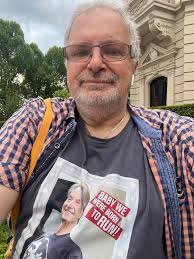 Sitting at my favorite place in Bad Nauheim at the Hotel Grunewald where  Elvis lived for awhile wearing a Garry Tallent shirt with Elvis