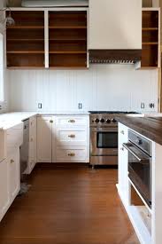 If you're one of those people that unpacks your entire cabinets contents when searching for something, raise your hand. Farmhouse Kitchen Adding A Shelf Below Our Upper Cabinets Other Layouts We Considered The Grit And Polish