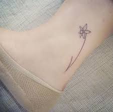 100 Tattoos Every Woman Should See Before She Gets Inked Tattooblend Daffodil Tattoo Tattoos Trendy Tattoos