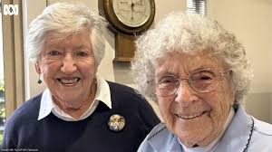 On a chilly winter's day, Esme Rash is flipping through a photo album.  "That was my first bike, which I used to ride the 5 miles [8 kilometres] to  my high school