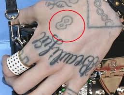 And it's totally out of this world. Grimes Musician 16 Tattoos Their Meanings Body Art Guru