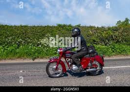Image result for Orange Red 1957 Motorcycle