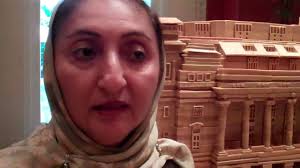 Madam Aloyah who bakes the Kueh Lapis