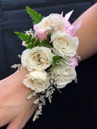 The white borders and seed brackets look great with any flower. Wrist Corsage White Flowers Pink Ribbon In San Jose Ca Bee S Flowers