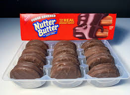 Dip cooled cookies into almond bark. Review Nabisco Fudge Covered Nutter Butter Junk Banter