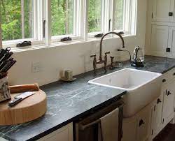 Amazing kitchen design with white kitchen cabinets & kitchen island, soapstone counter tops, hudson valley naugatuck large pendants, pot. Soapstone Countertops Legacy Countertops Charlotte Nc