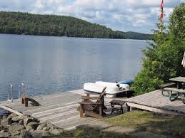 Lakeside Dock With Swim Ladder And Chairs Boat Dock Outdoor Decor Outdoor