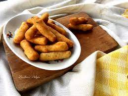 2 pizzichi di pepe nero macinato ; Bracioline Di Patate Calabresi Zucchero E Valigia