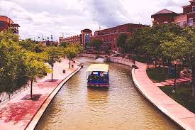 The riverwalk was constructed as part of an effort to attract tourists and trade to the city. The Historic Arkansas Riverwalk Photograph By Mountain Dreams