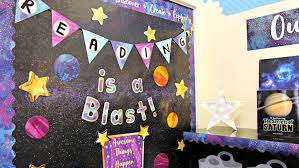 If you want to give your facade a quick and easy makeover for spring, the front door is a great place to get started: Galaxy Classroom Theme Space Decor Planet Decorations