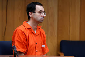 Larry nassar, the former sports doctor who admitted molesting some of the nation's top gymnasts, appears in court in 2018. Larry Nassar Sentenced To At Least 40 More Years In Michigan Prison Live Updates Cbs News